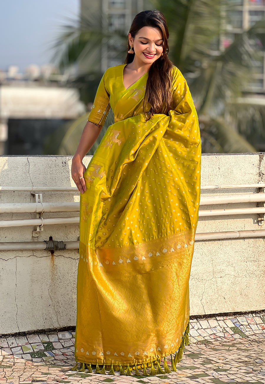 Mehendi green soft silk dual zari woven saree with deer border