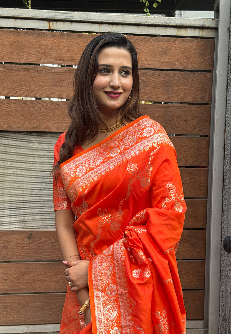 Orange banarasi jaal soft silk zari woven saree