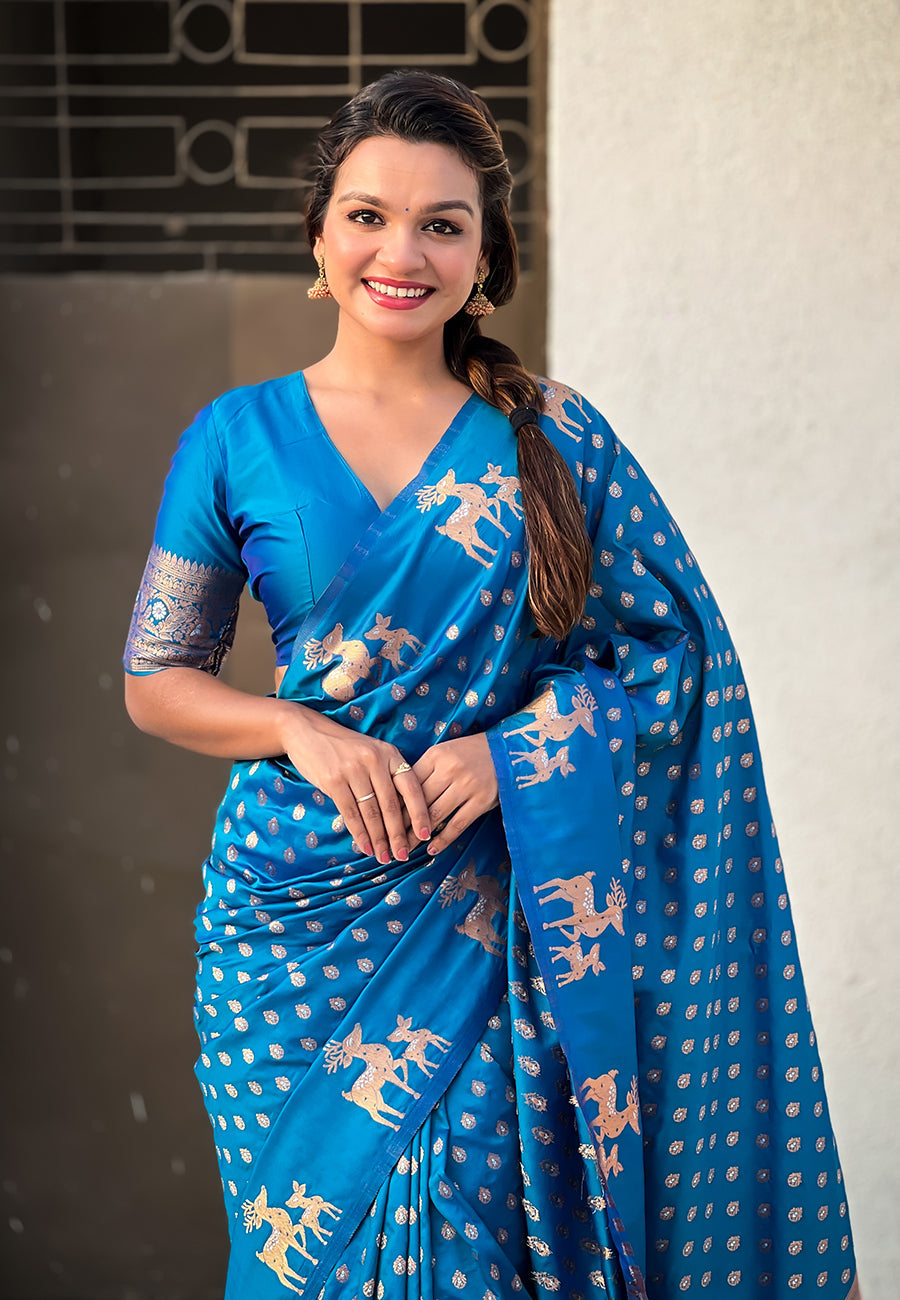 Blue soft silk dual zari woven saree with deer border