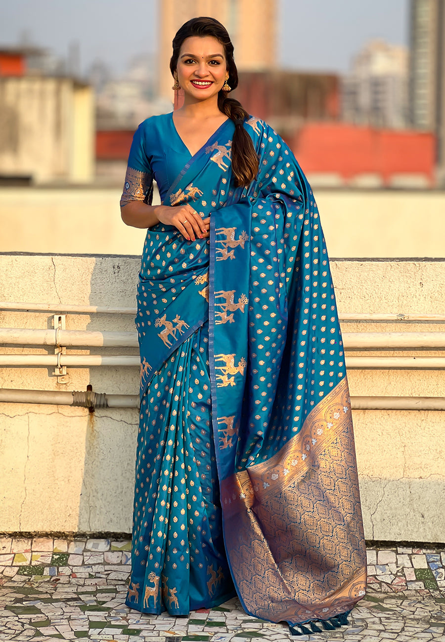 Blue soft silk dual zari woven saree with deer border