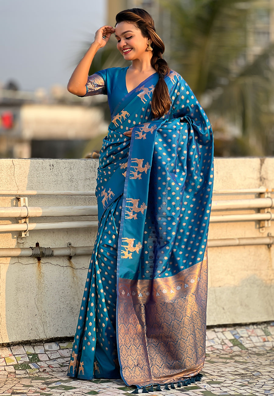 Blue soft silk dual zari woven saree with deer border