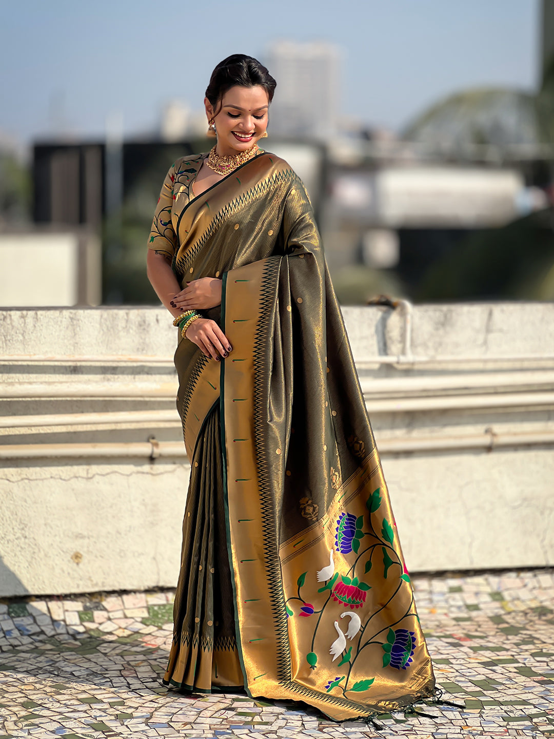 Bottle green tissue paithani zari woven saree