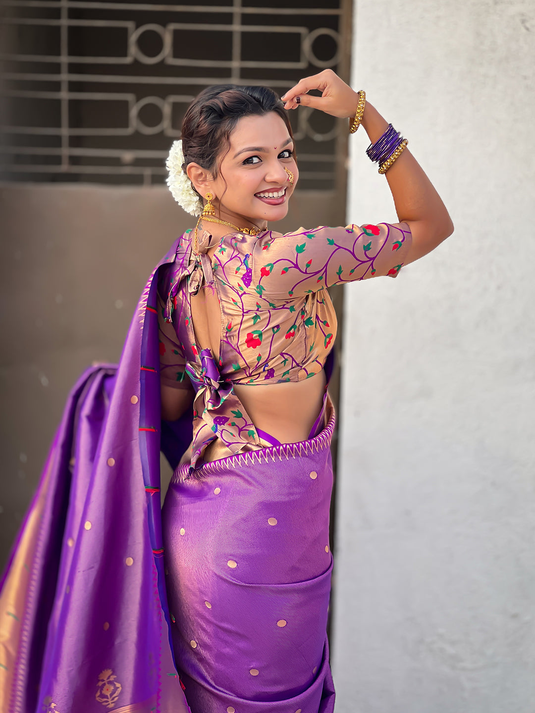 Purple tissue paithani zari woven saree