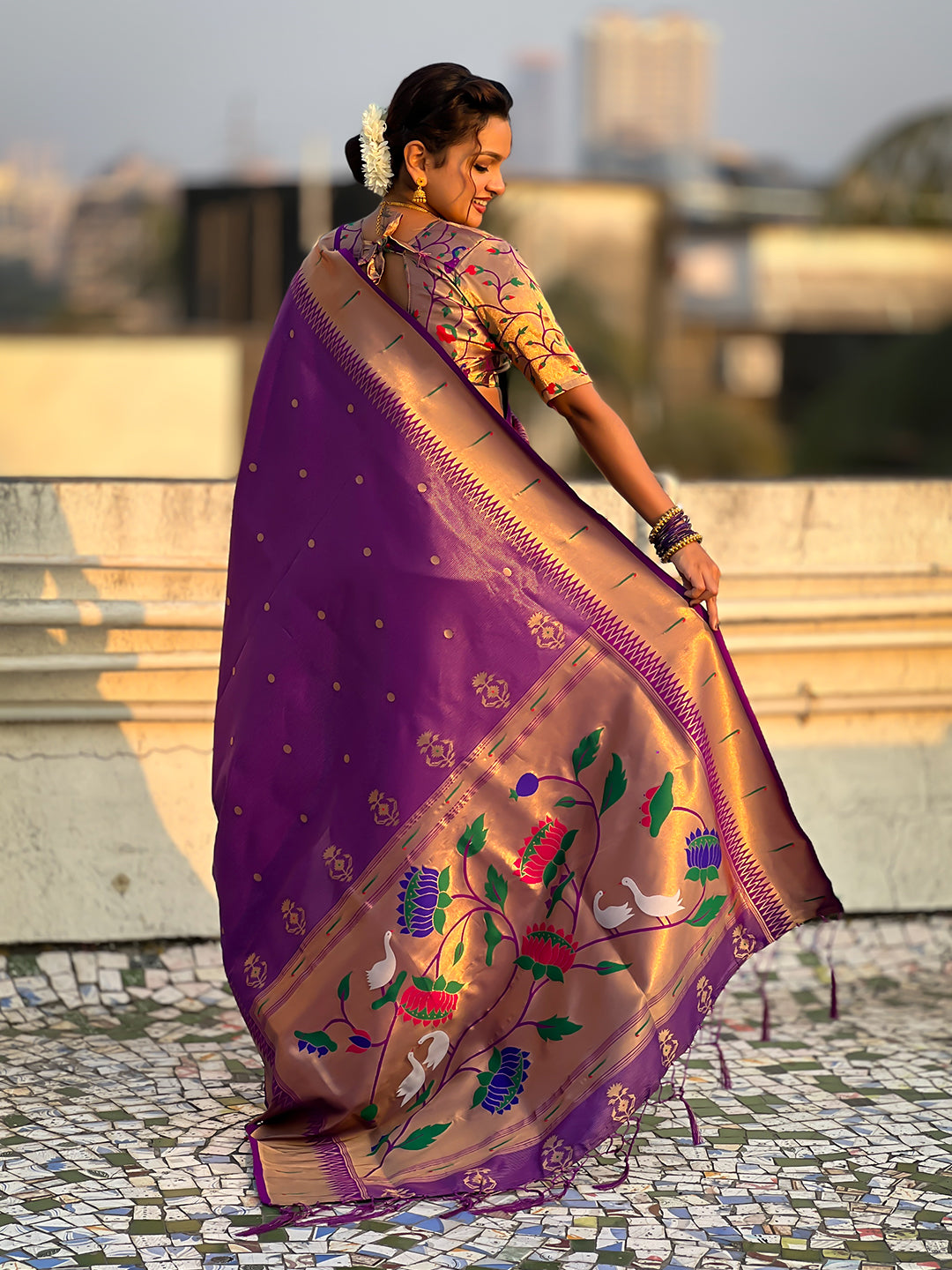 Purple tissue paithani zari woven saree