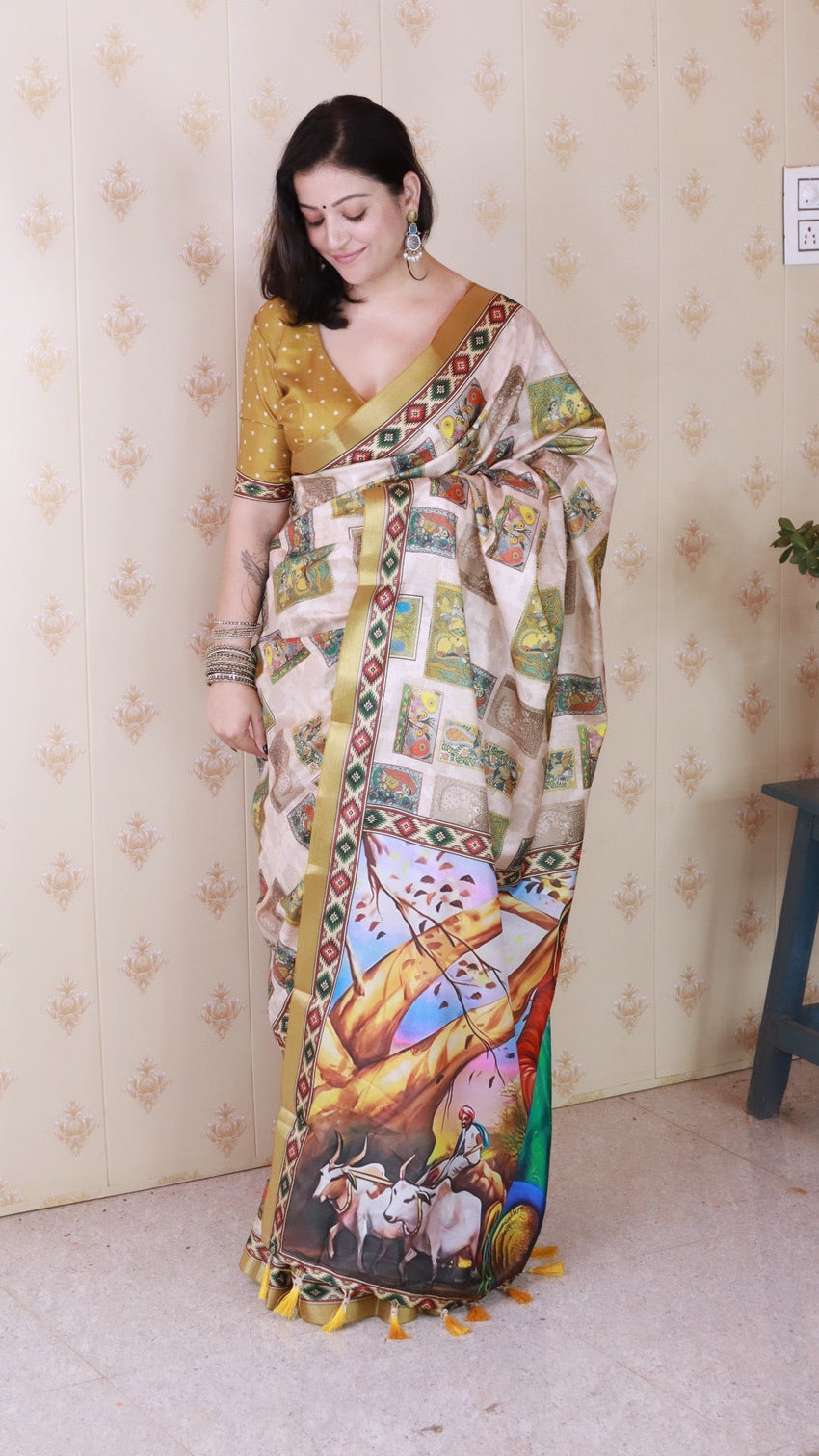 Gold tussar silk bold kalamkari figure printed saree with zari woven border
