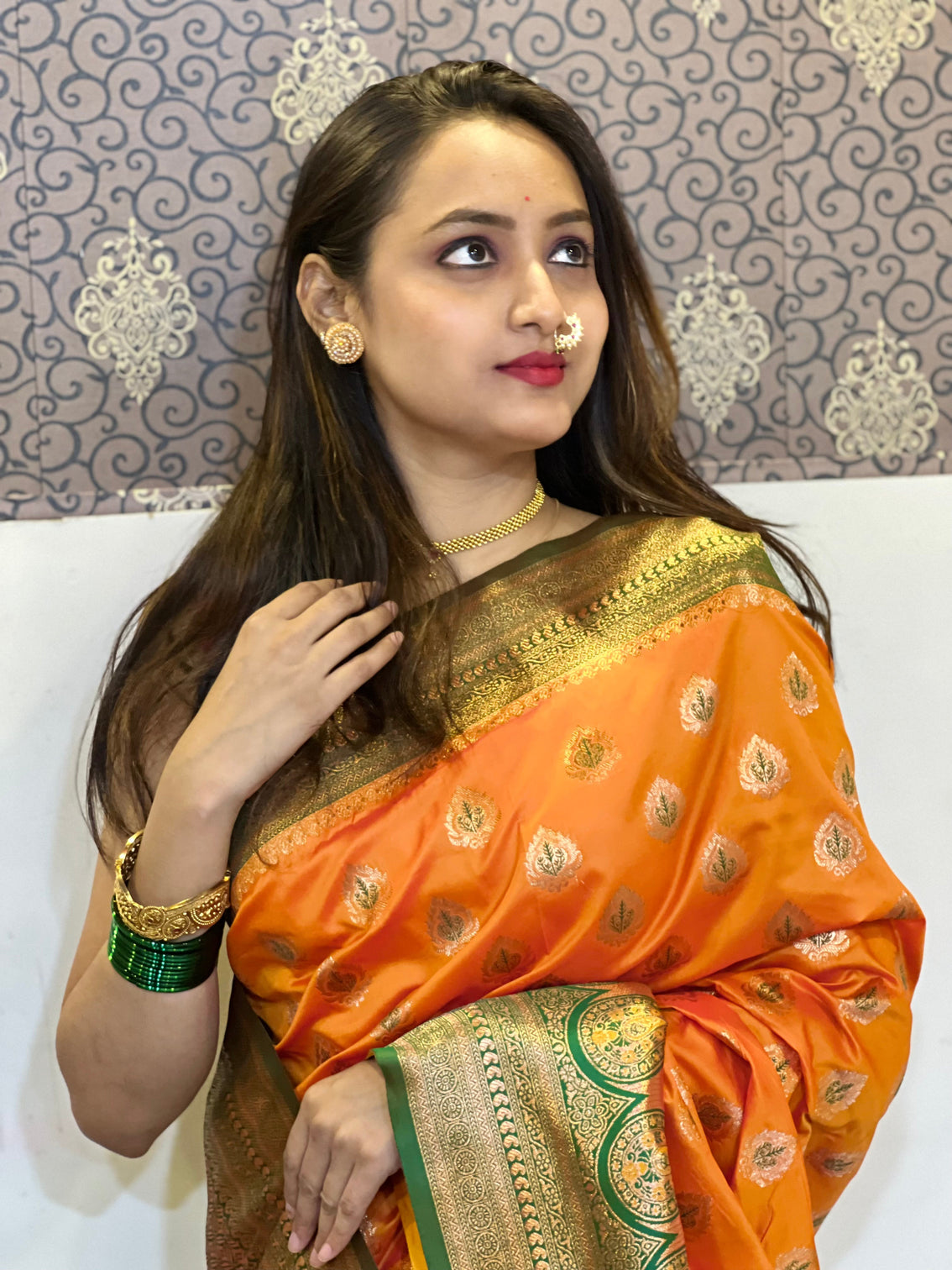 Orange soft silk contrast zari woven saree