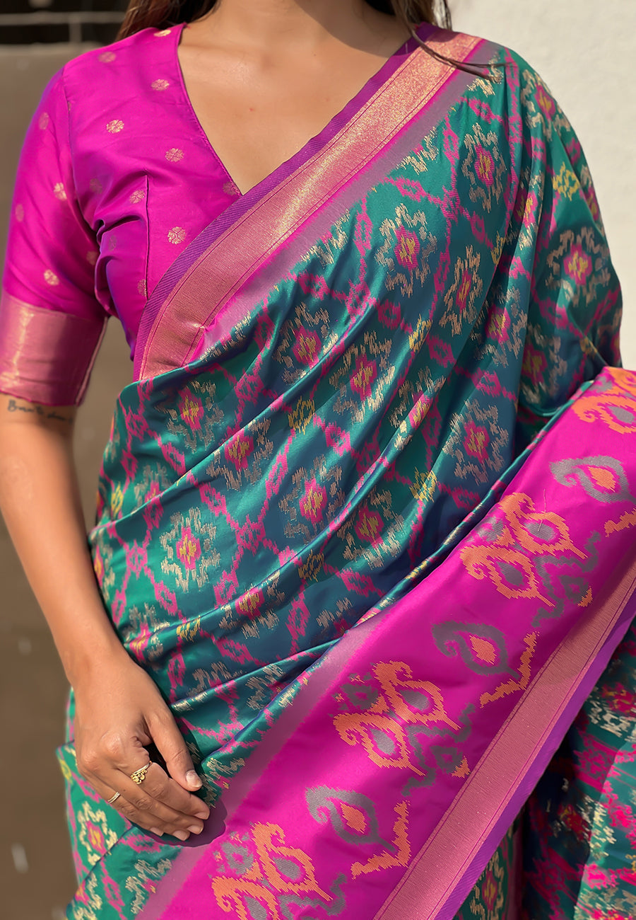 Green soft silk zari woven patola saree with contrast weaves