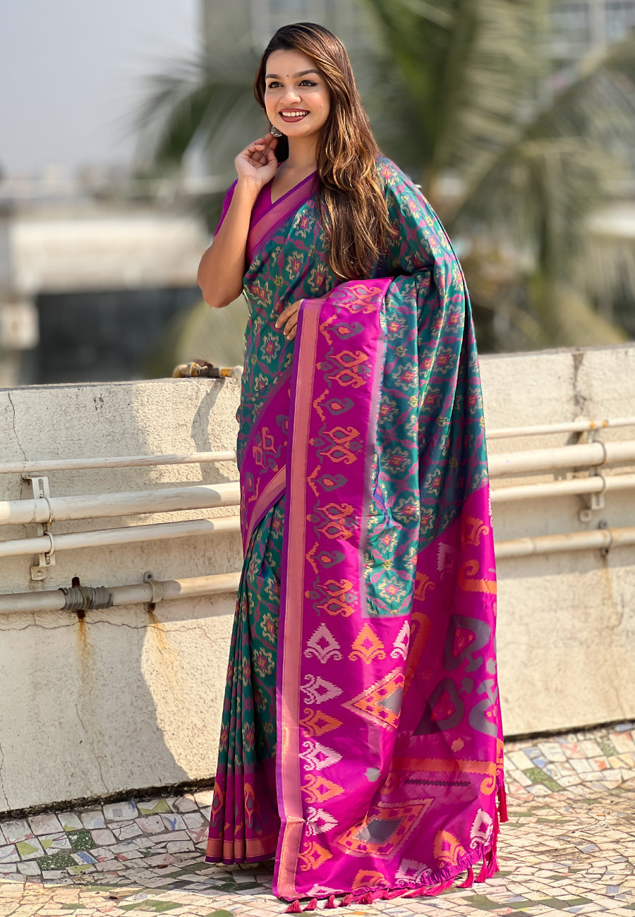 Green soft silk zari woven patola saree with contrast weaves