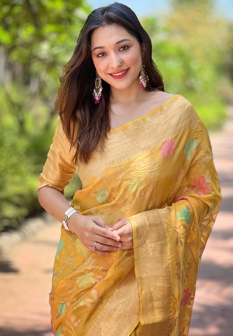 Yellow organza meenakari floral jaal zari woven saree