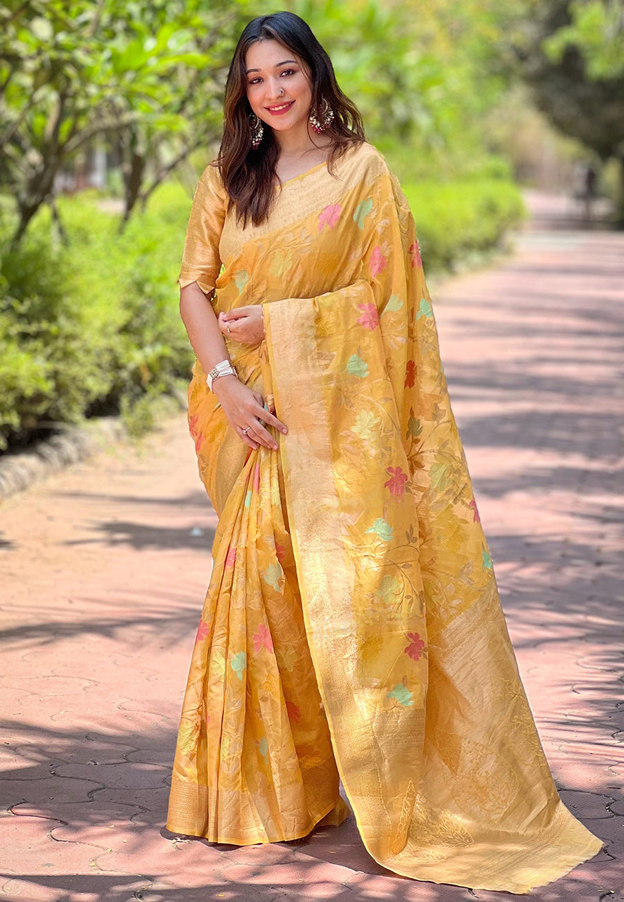Yellow organza meenakari floral jaal zari woven saree