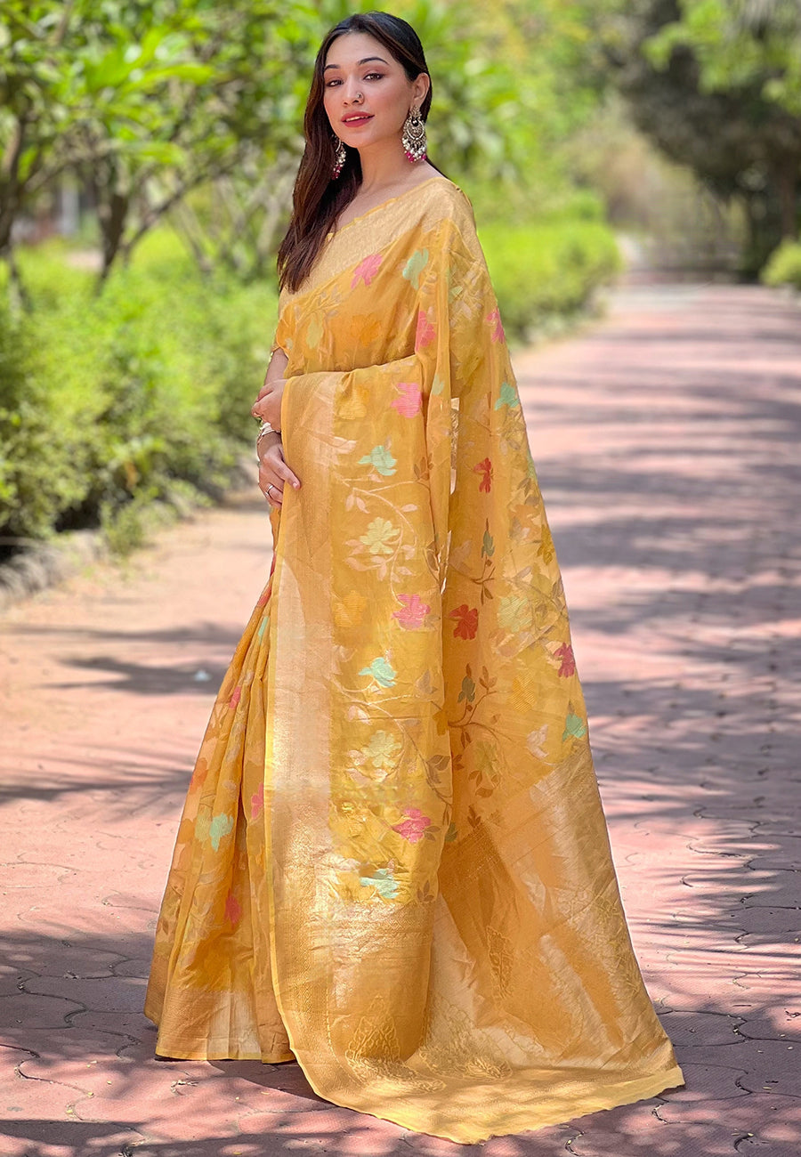 Yellow organza meenakari floral jaal zari woven saree