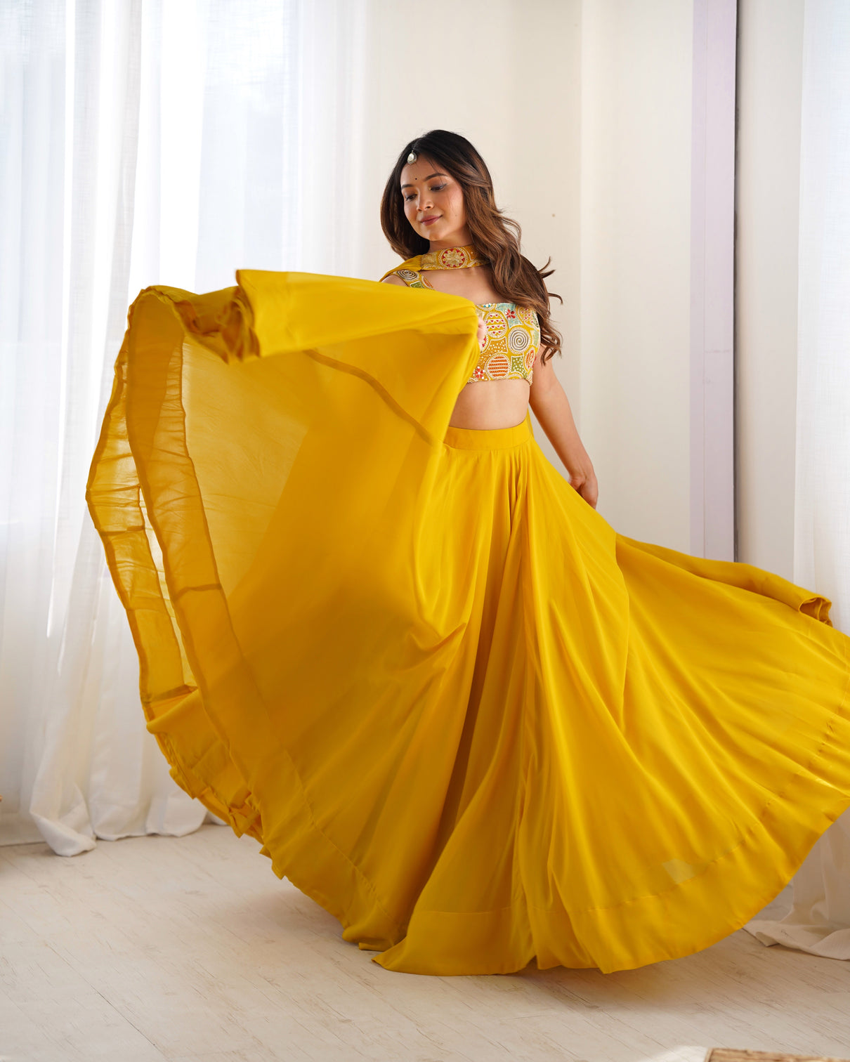 Radiant yellow pure soft fox georgette embroidered lehenga choli 8 meter flair