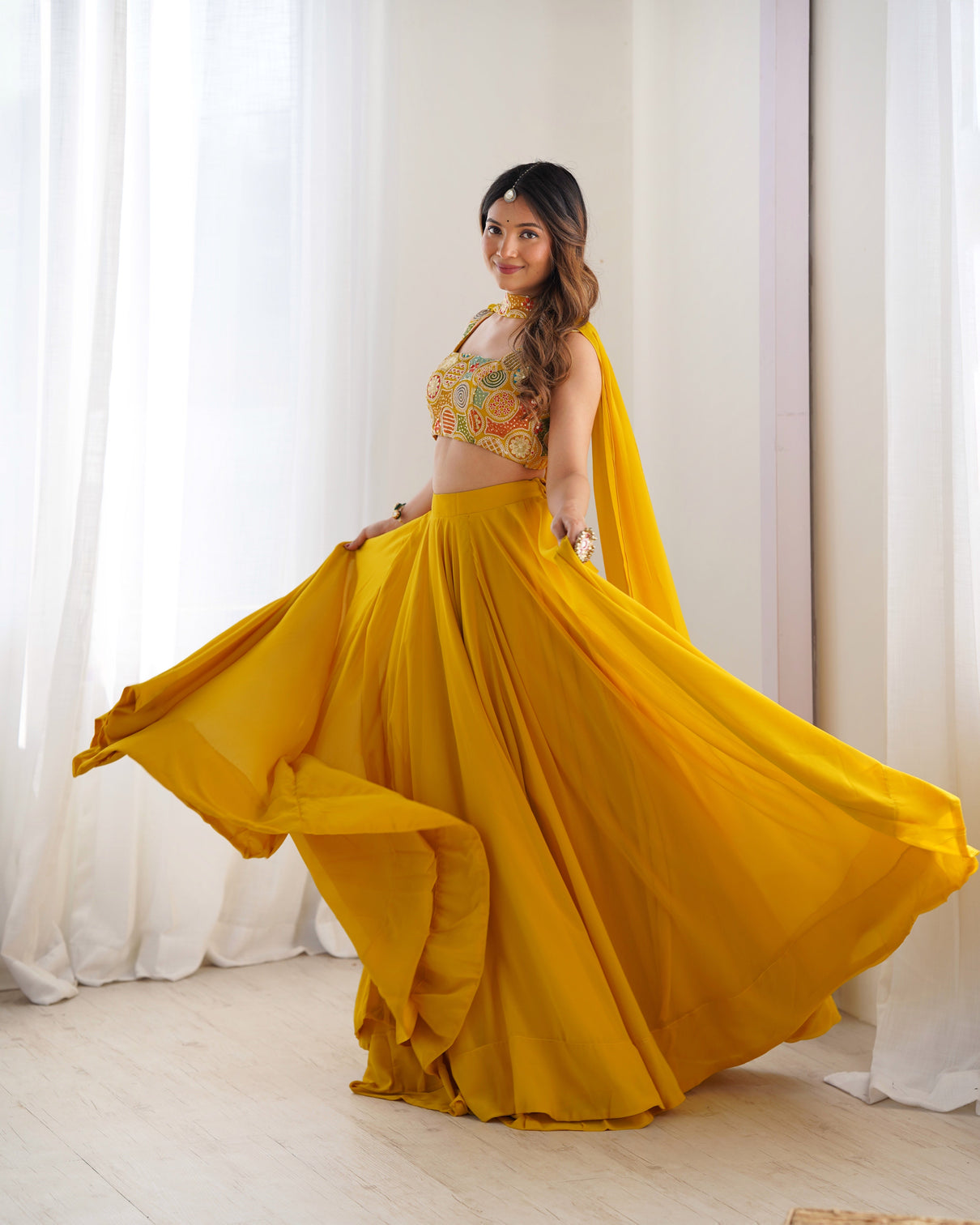 Radiant yellow pure soft fox georgette embroidered lehenga choli 8 meter flair