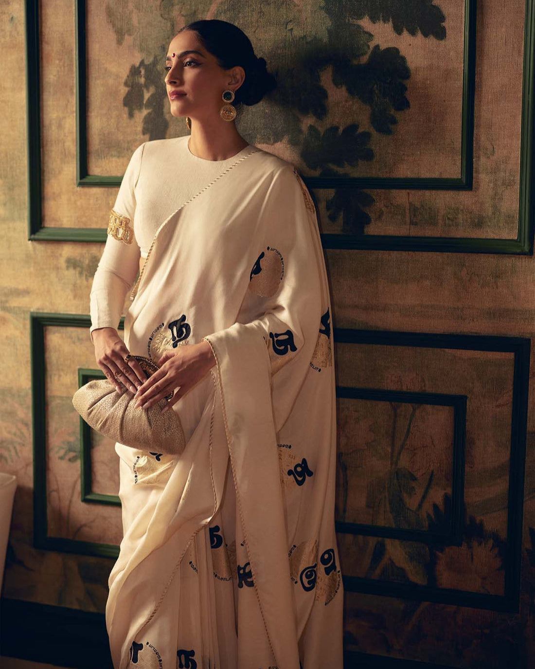 Cream Satin Georgette Saree with Golden and Black Calligraphy Print