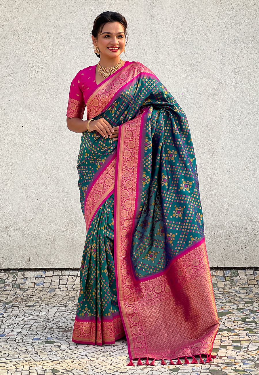 Green soft silk zari woven premium patola saree with contrast weaves