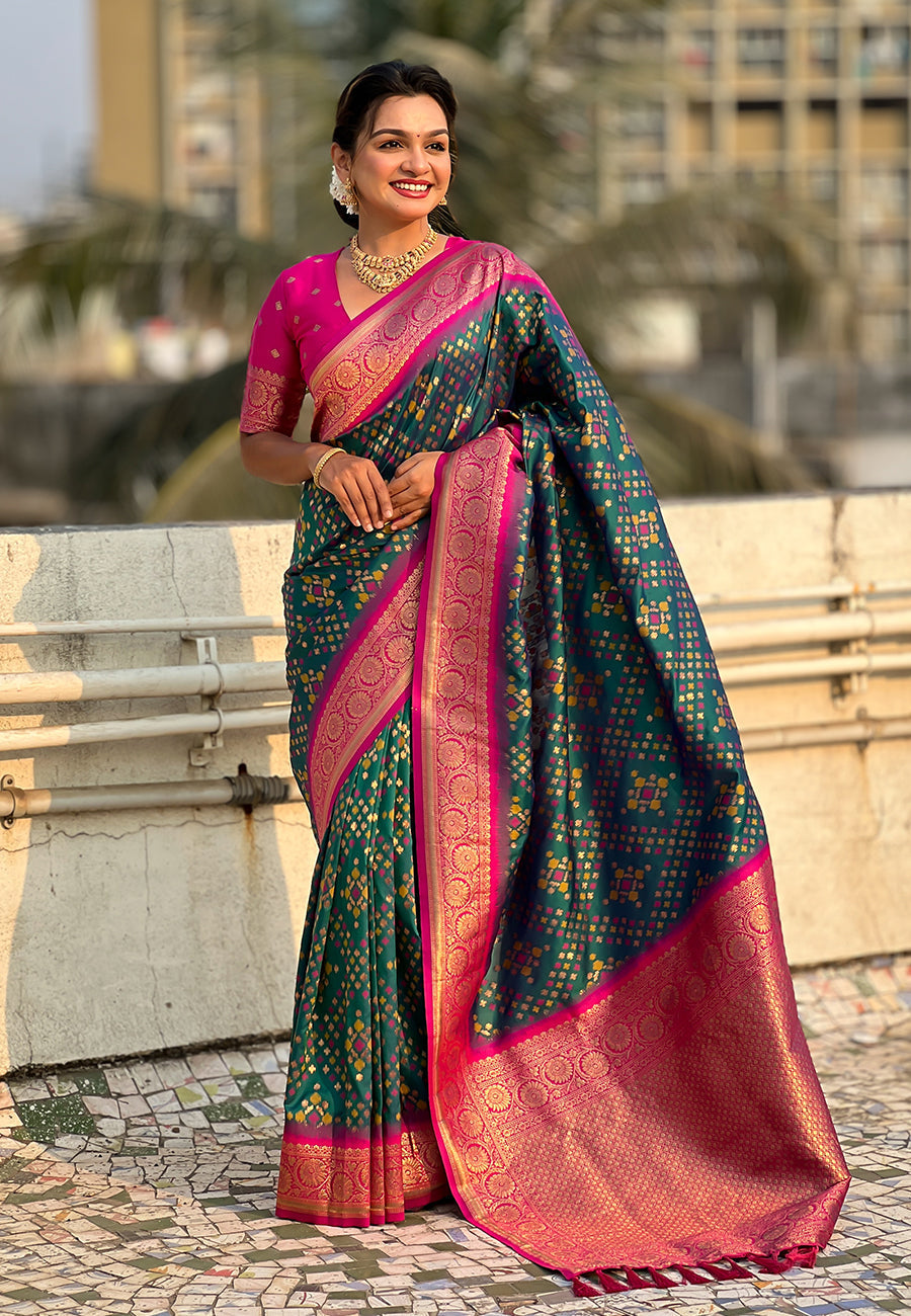 Green soft silk zari woven premium patola saree with contrast weaves