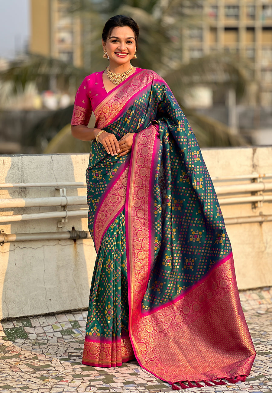 Green soft silk zari woven premium patola saree with contrast weaves