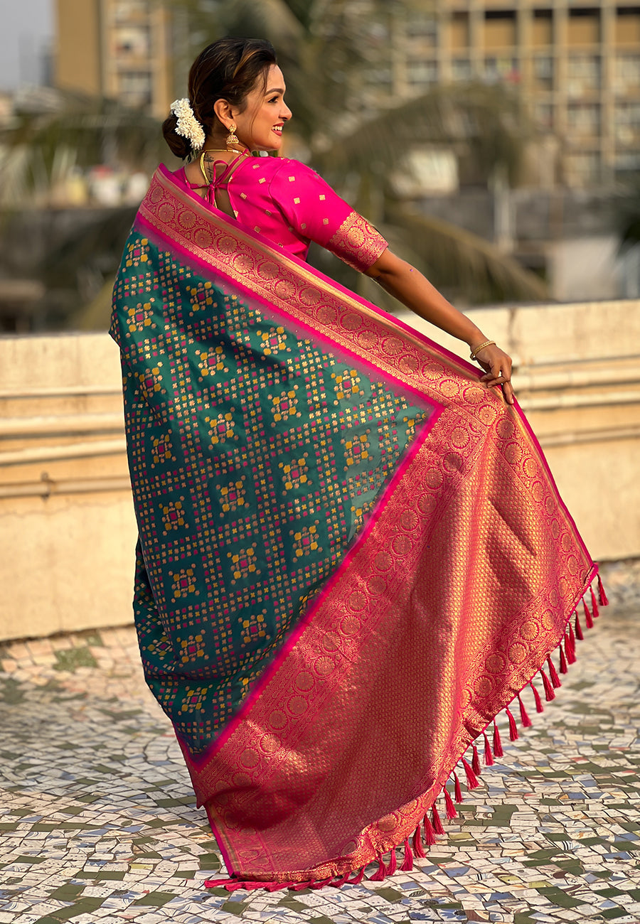 Green soft silk zari woven premium patola saree with contrast weaves