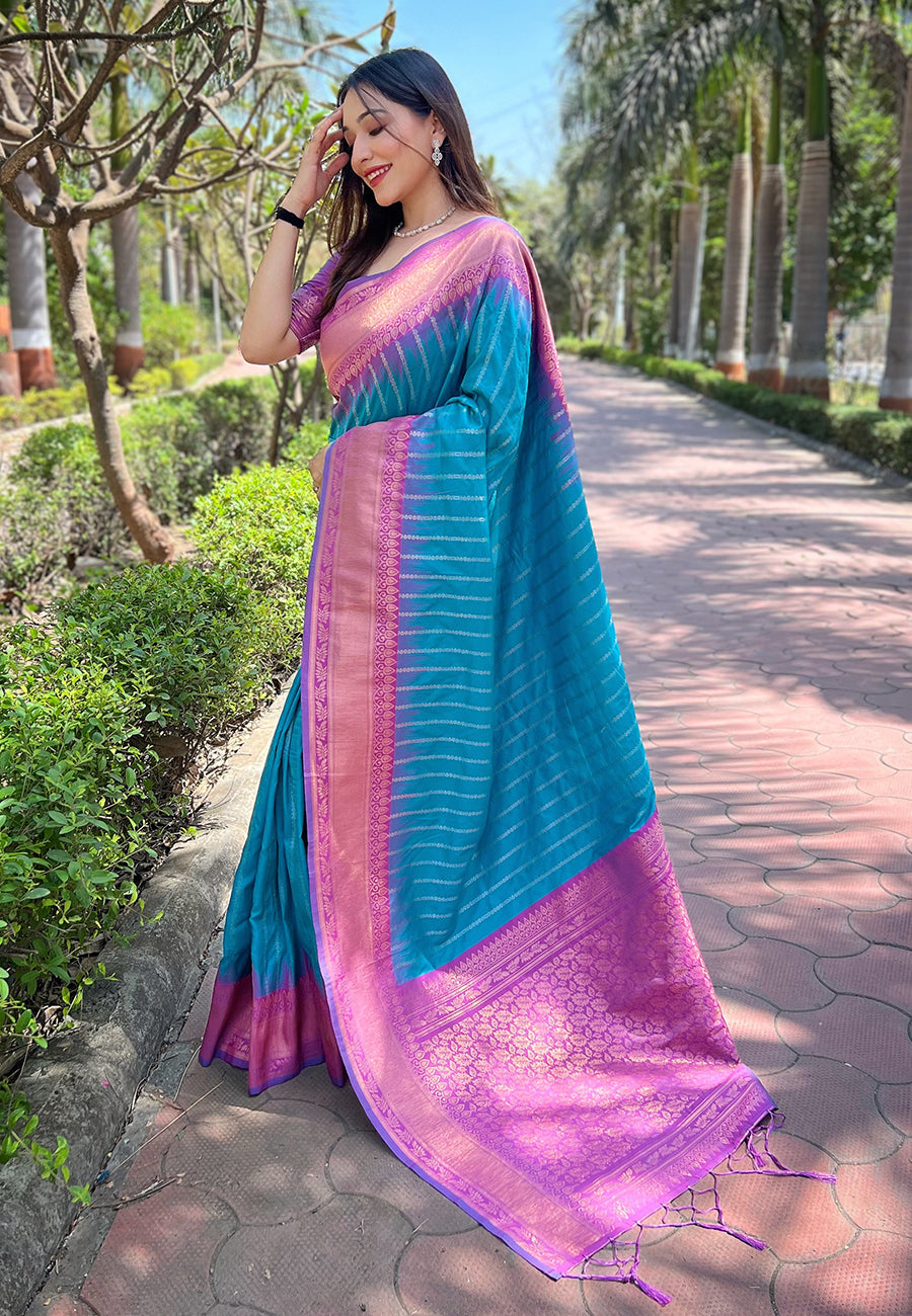 Light blue soft silk floral border contrast zari woven saree