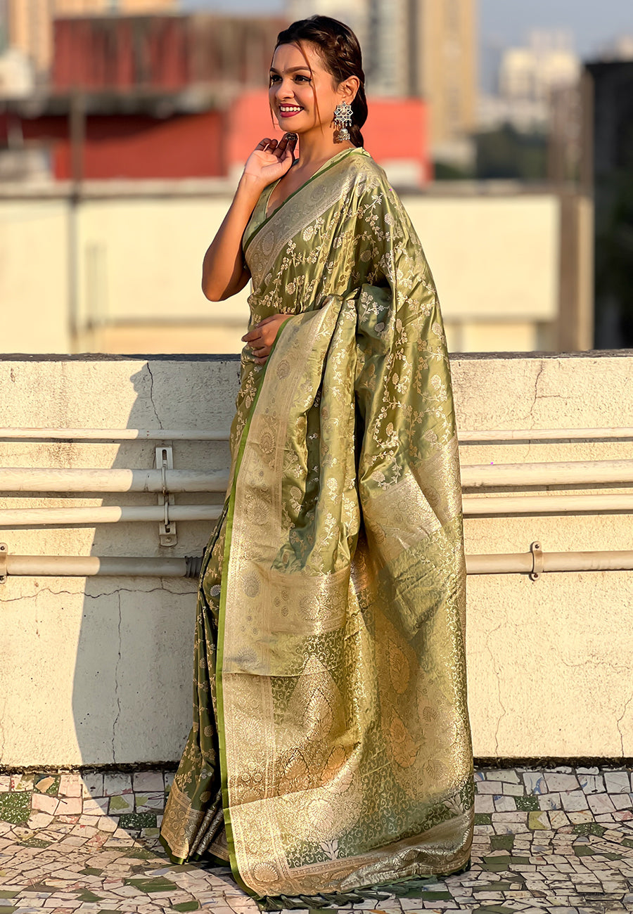 Green banarasi jaal satin silk pink zari woven saree