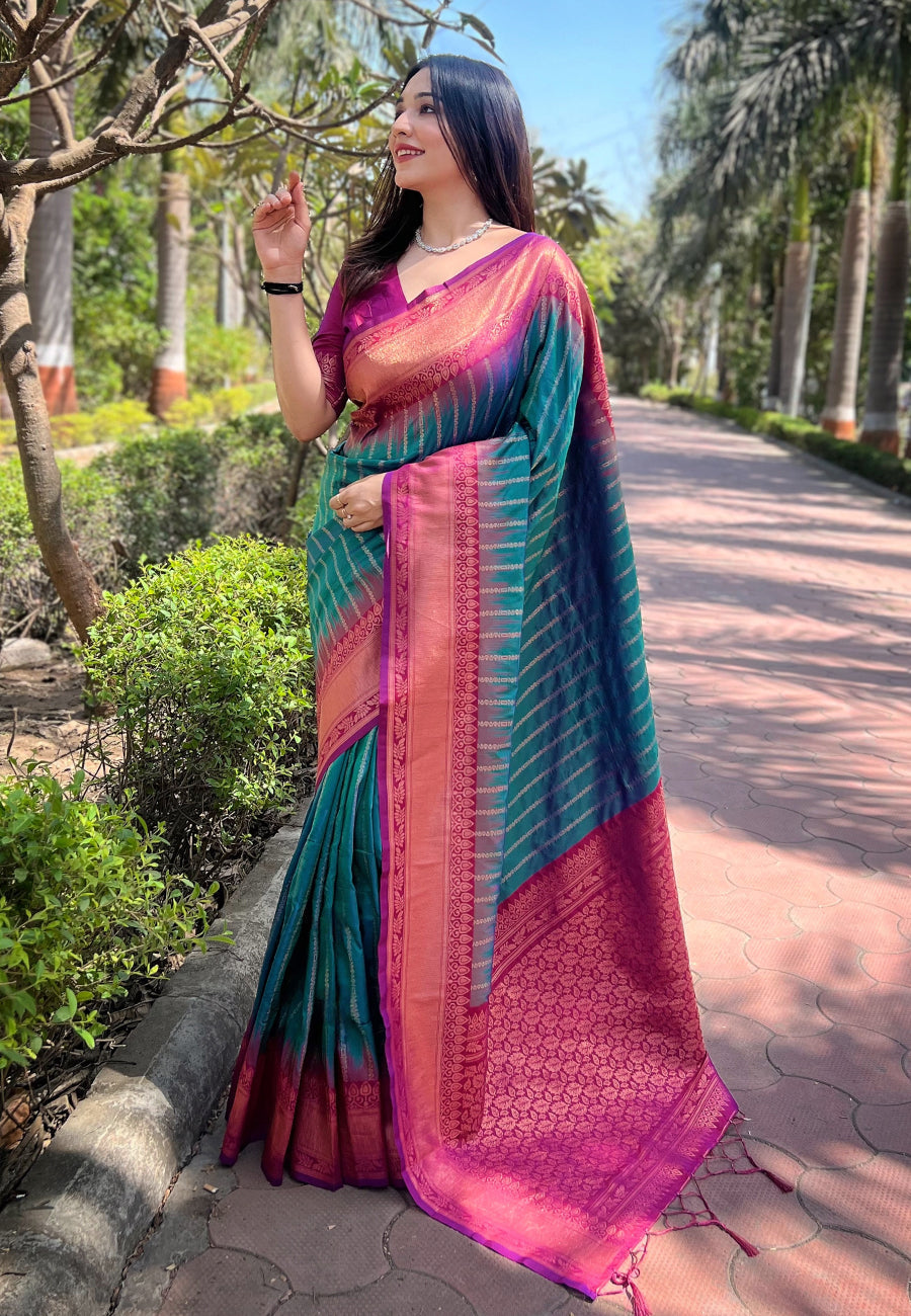 Bottle green soft silk floral border contrast zari woven saree