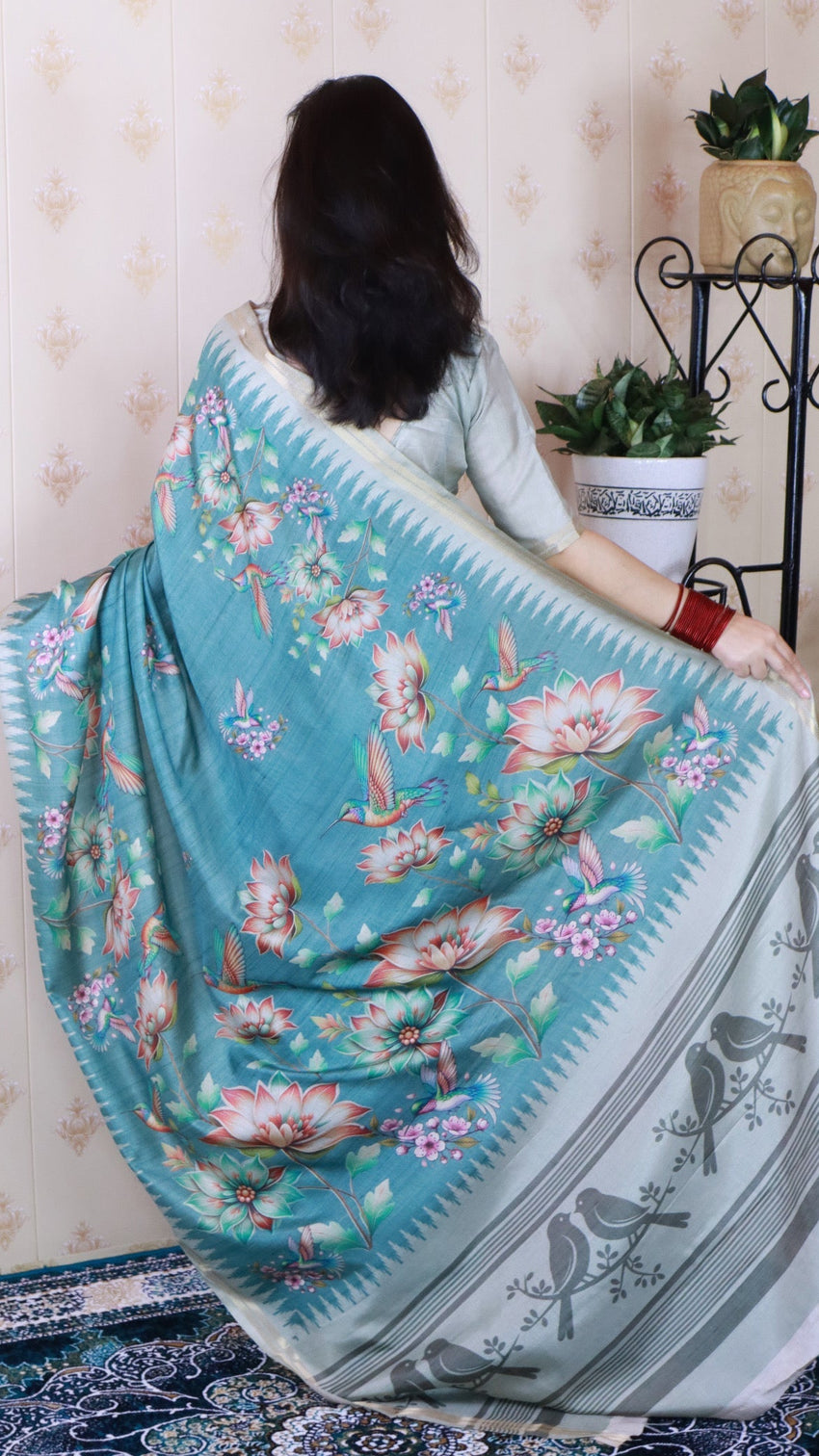 Dusty blue soft tussar silk nature printed zari woven saree
