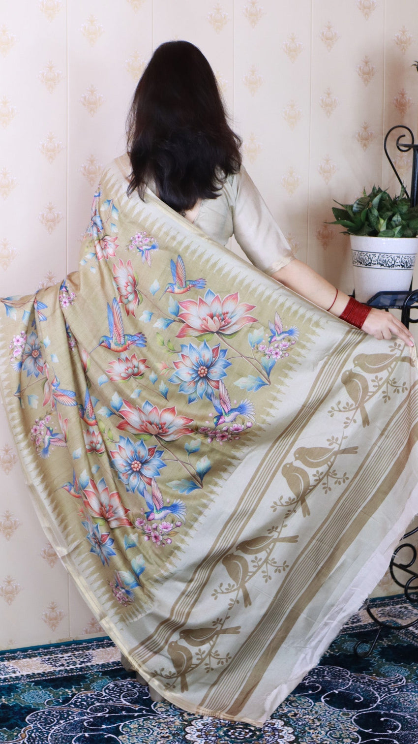 Dusty gold soft tussar silk nature printed zari woven saree
