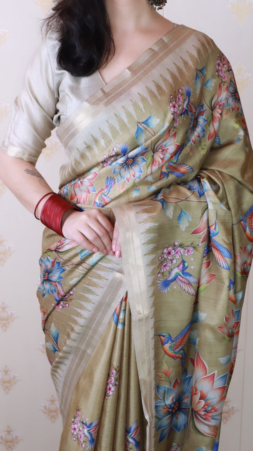 Dusty gold soft tussar silk nature printed zari woven saree