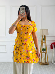 Bright yellow floral cambric cotton kurti with corset back mameraa