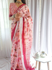 Blush pink handwoven linen saree with vibrant autumn motifs tassel detailing mameraa