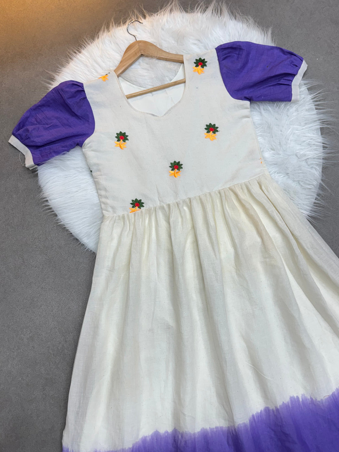 Cream lavender mul cotton flared dress with puff sleeves and floral embroidery