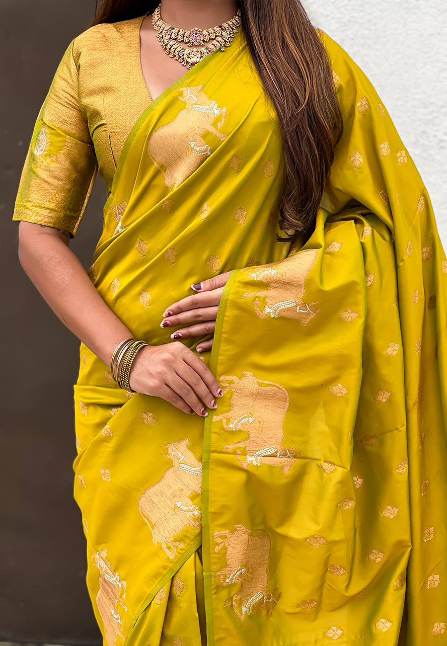Mehendi green soft silk dual zari woven saree with nandi border