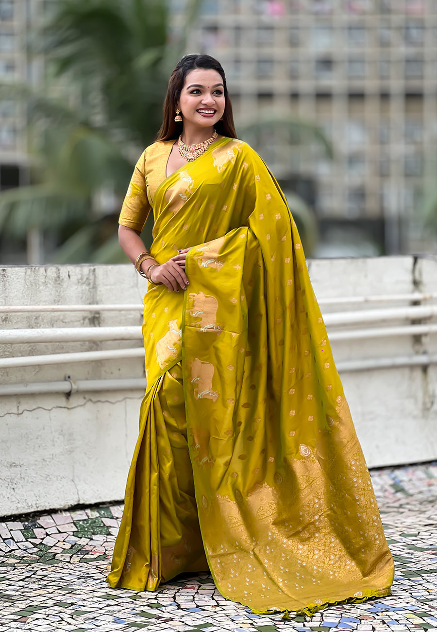 Mehendi green soft silk dual zari woven saree with nandi border