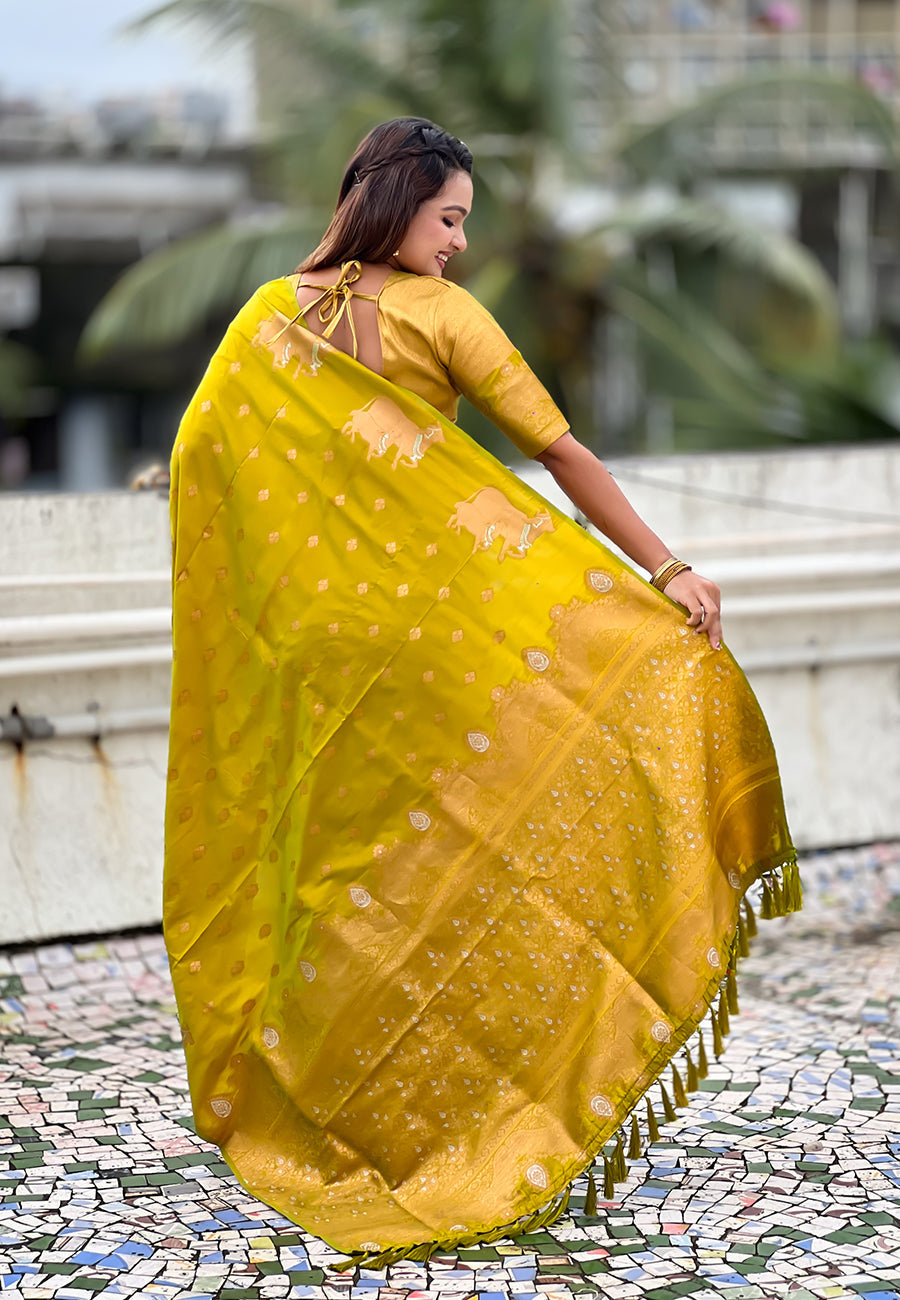 Mehendi green soft silk dual zari woven saree with nandi border