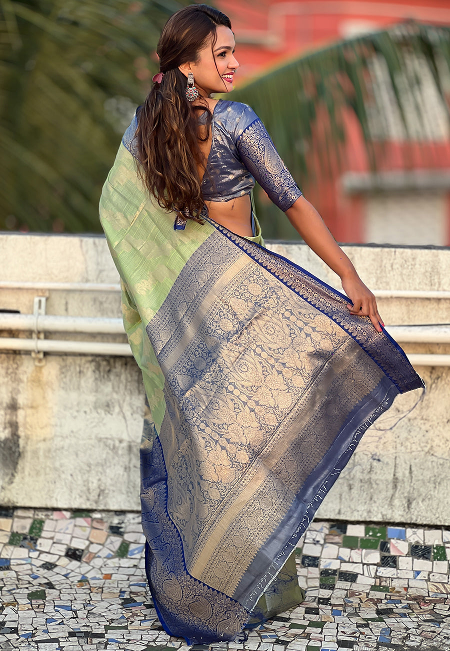 Green kanjivaram soft tissue silk leheriya traditional zari woven saree
