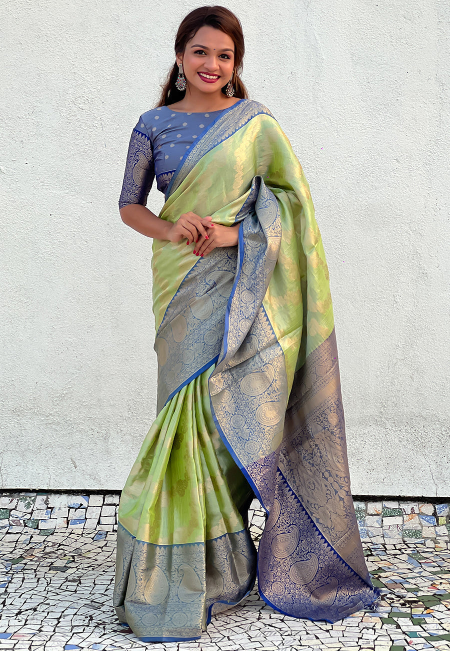 Green kanjivaram soft tissue silk leheriya traditional zari woven saree