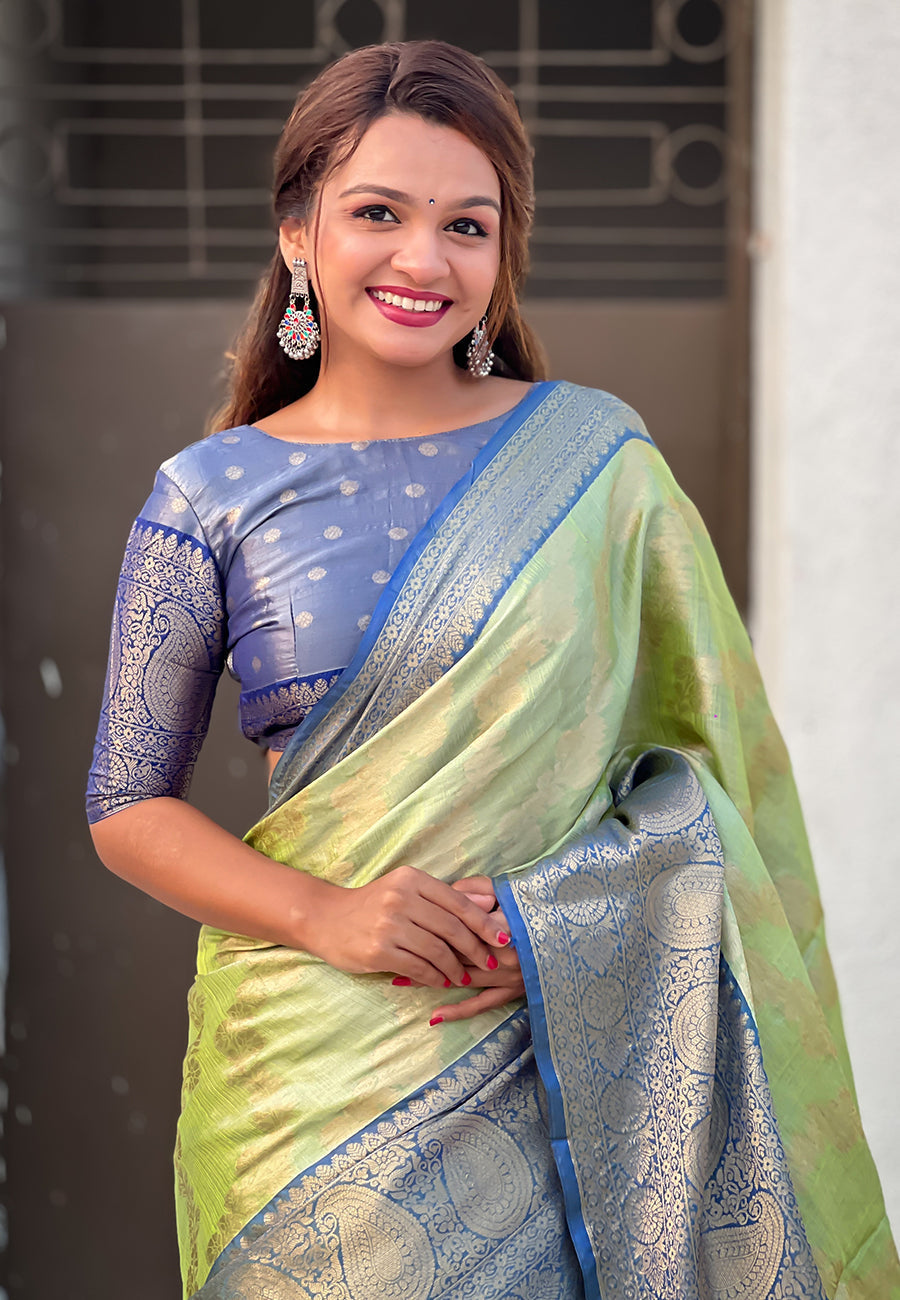 Green kanjivaram soft tissue silk leheriya traditional zari woven saree