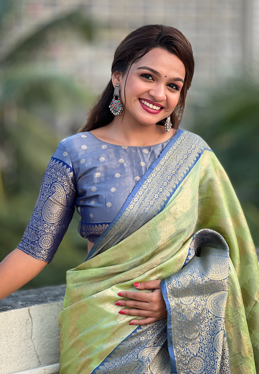Green kanjivaram soft tissue silk leheriya traditional zari woven saree