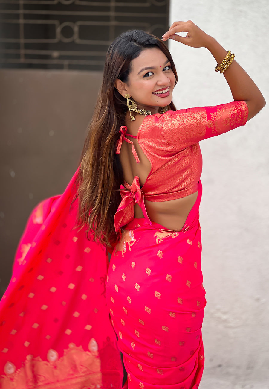 Pink soft silk dual zari woven saree with nandi border