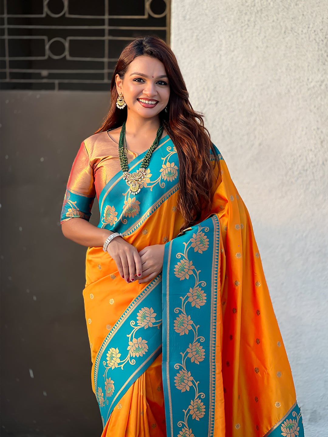 Orange soft silk lotus paithani saree
