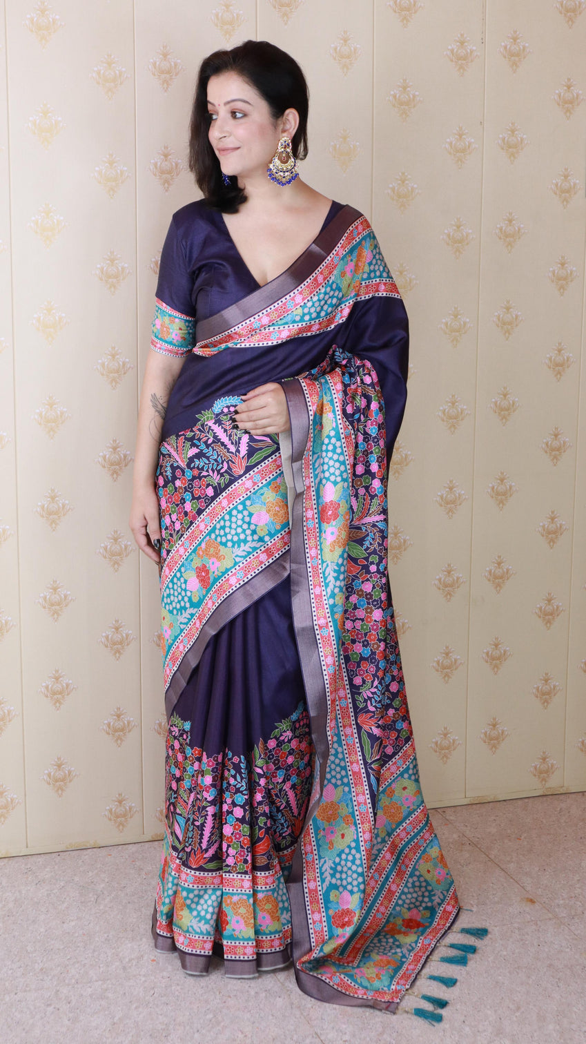 Navy blue tussar silk floral printed saree with zari woven border