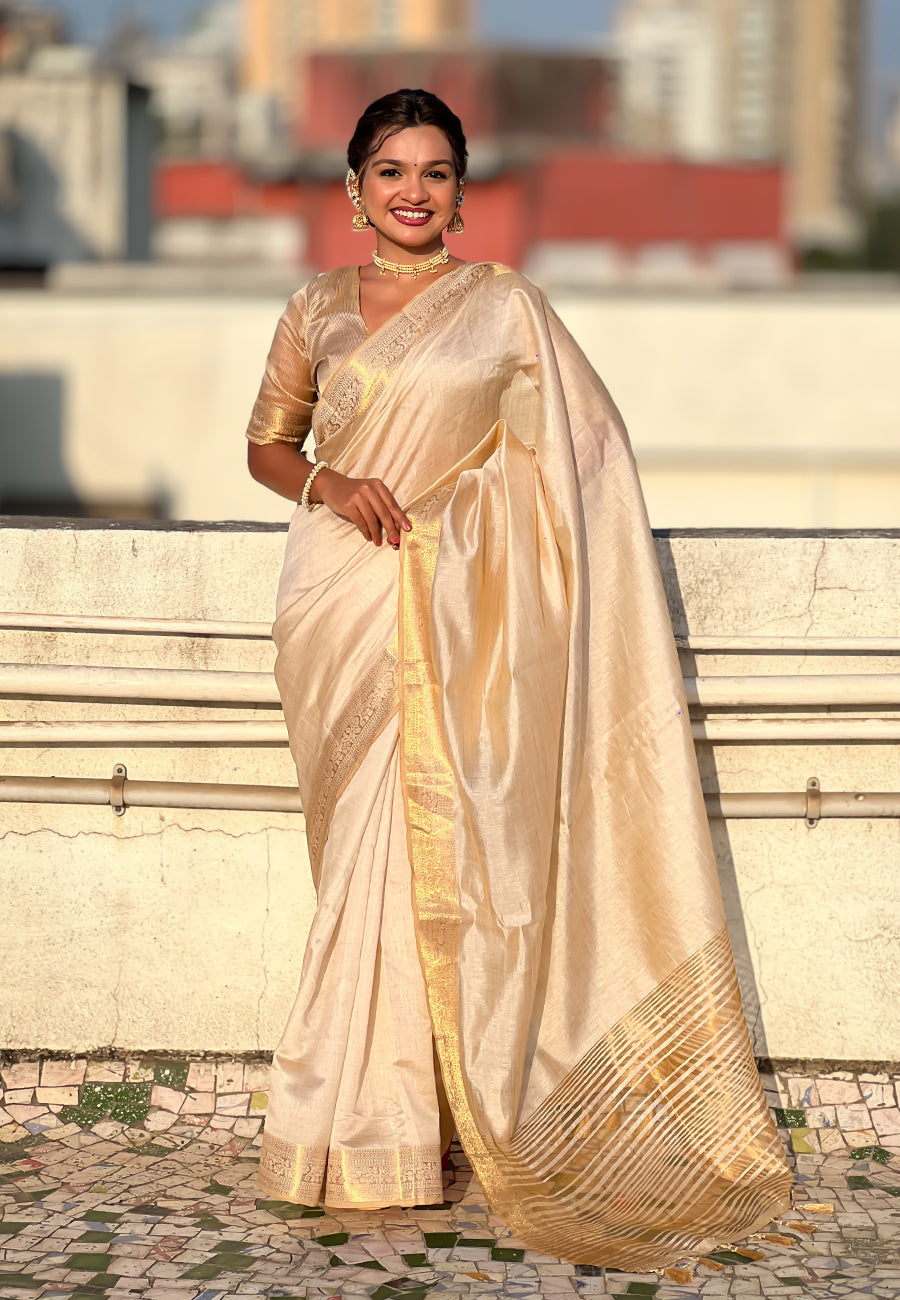 Chickoo tussar silk plain saree with zari woven border