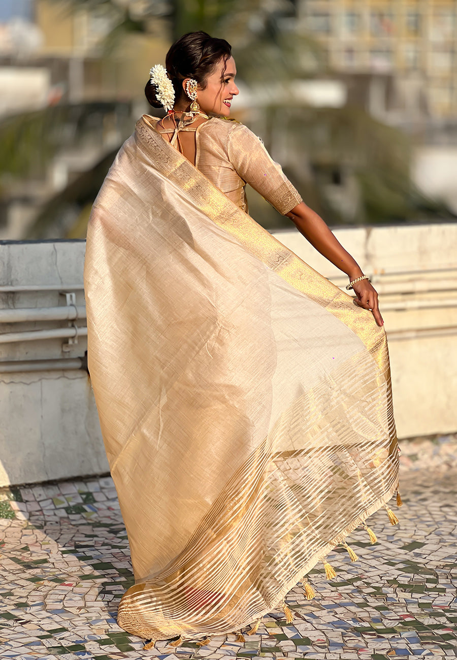 Chickoo tussar silk plain saree with zari woven border