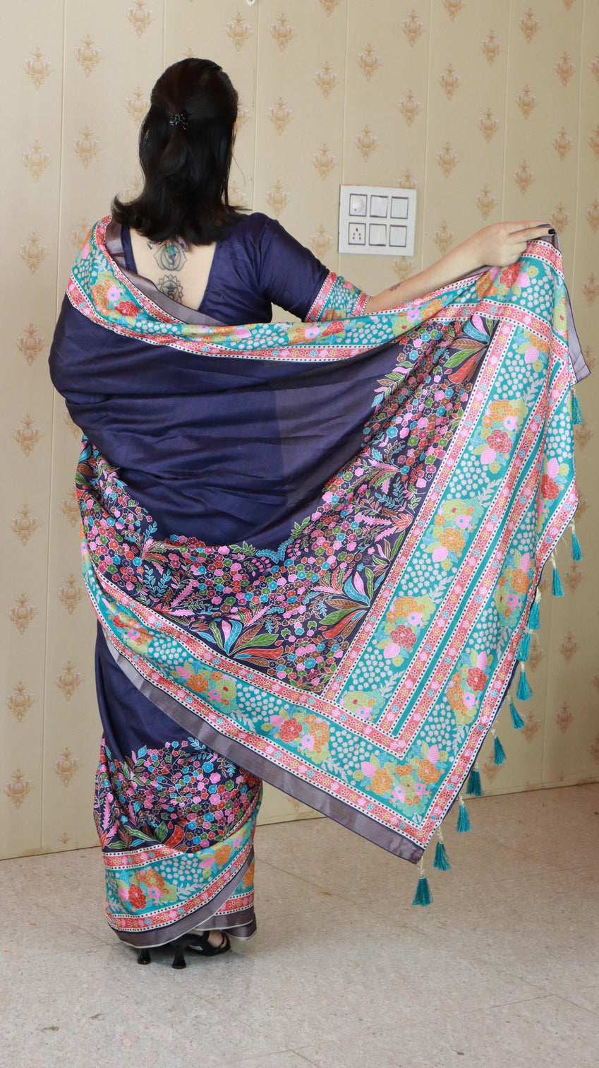 Navy blue tussar silk floral printed saree with zari woven border