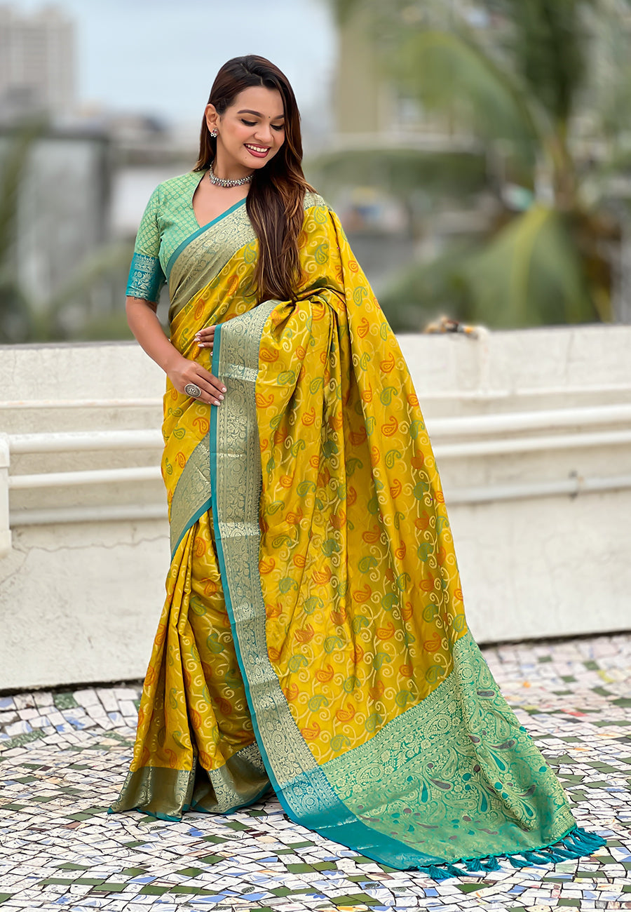 Mehendi green soft silk zari woven bandhani patola saree with contrast weaves