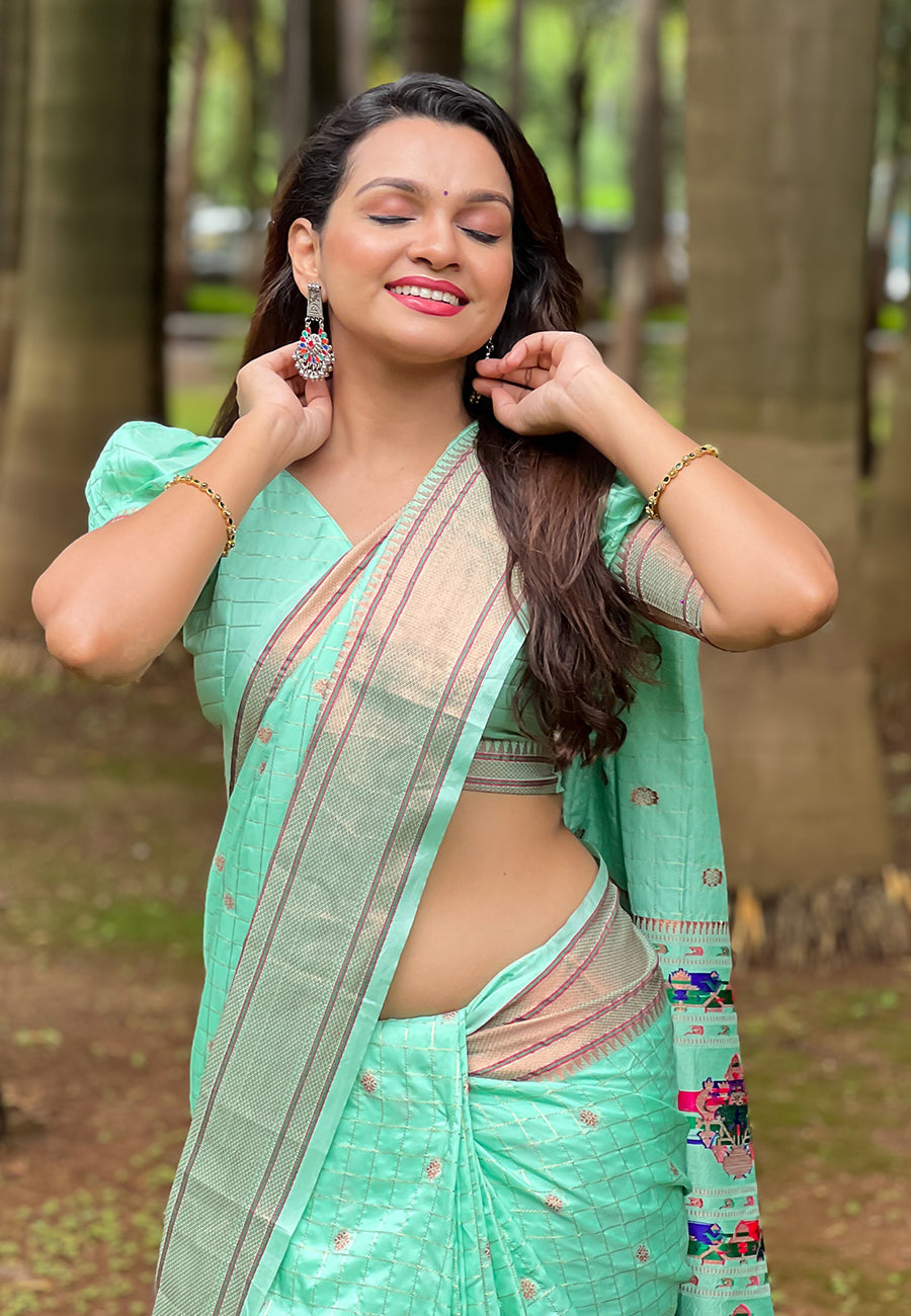 Pale turquoise checks paithani silk zari woven saree