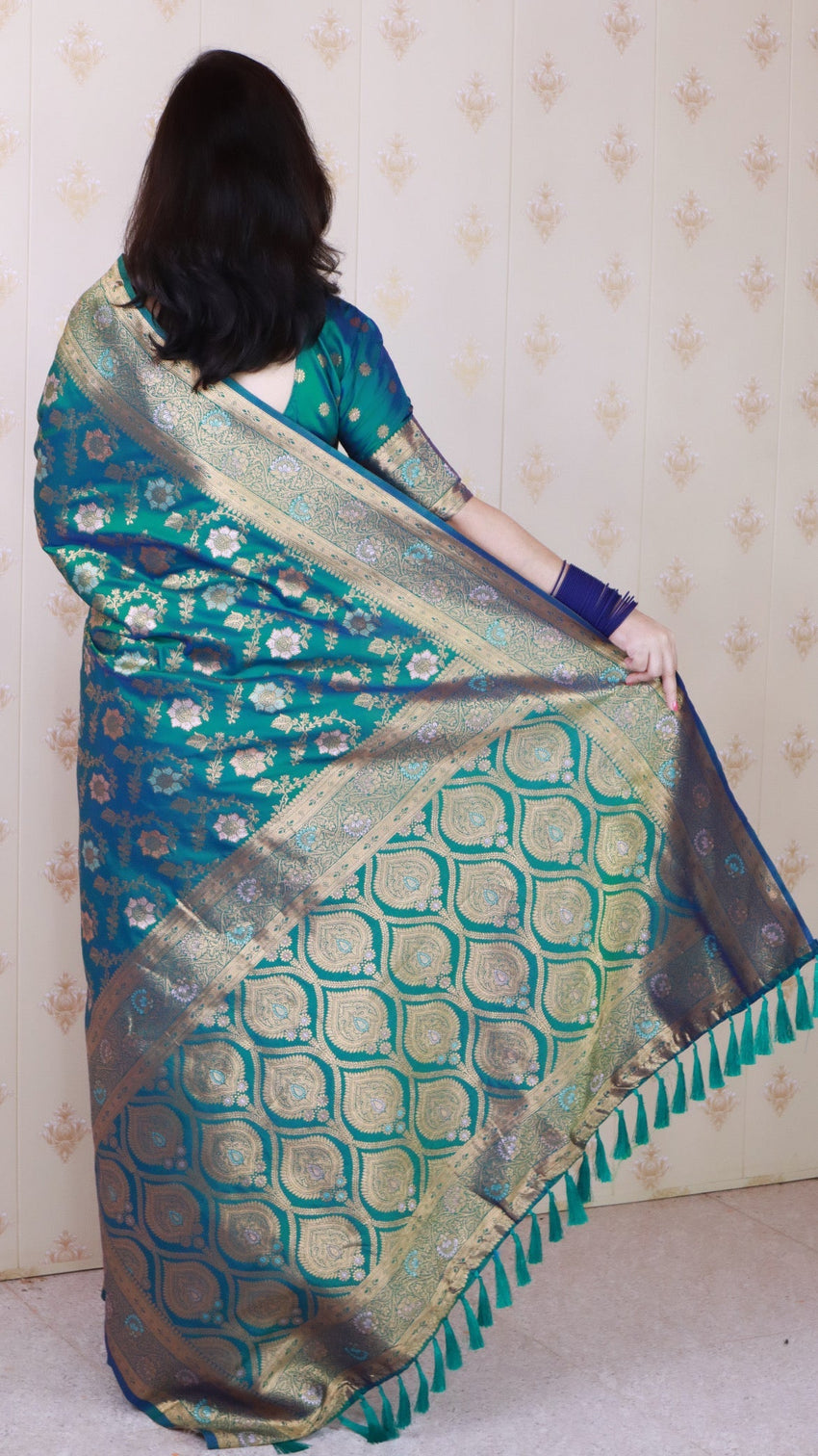 Green banarasi jaal soft silk gold zari meenakari woven saree