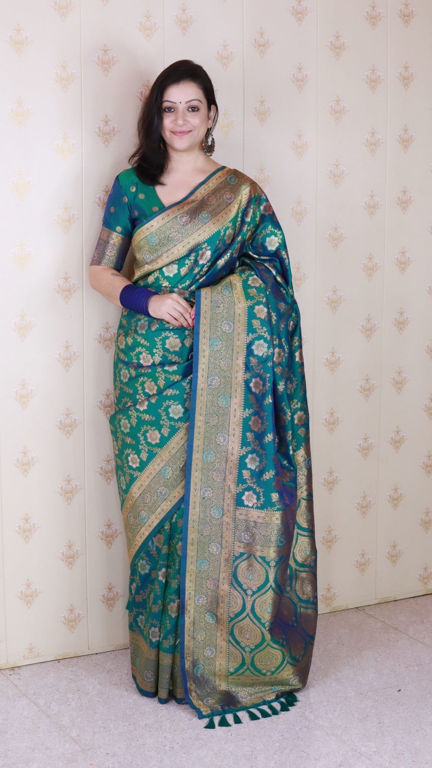 Green banarasi jaal soft silk gold zari meenakari woven saree