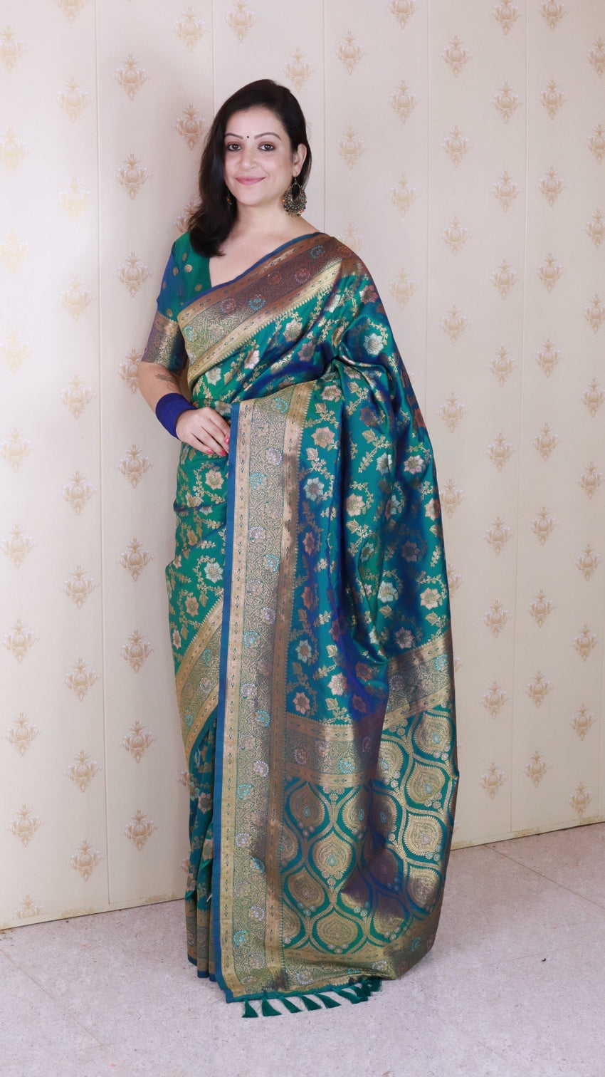 Green banarasi jaal soft silk gold zari meenakari woven saree