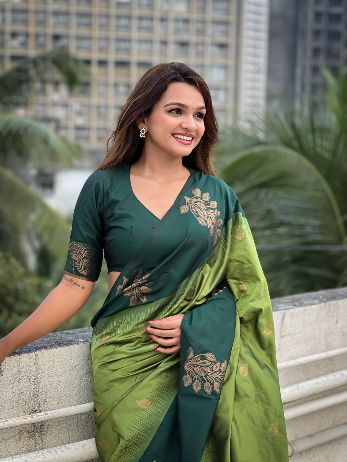 Iguana green soft silk floral border contrast zari woven saree